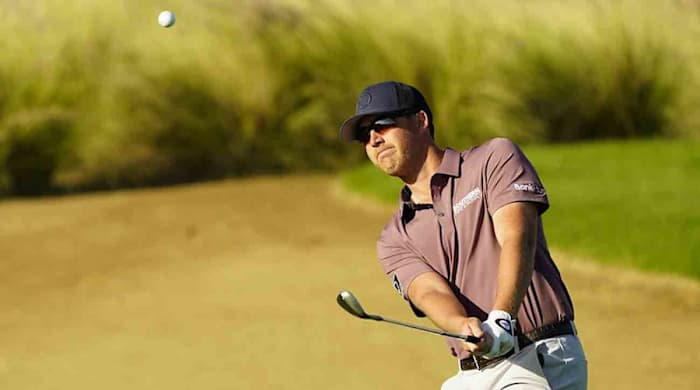 Andy Ogletree watches a shot at the 2023 Saudi International.